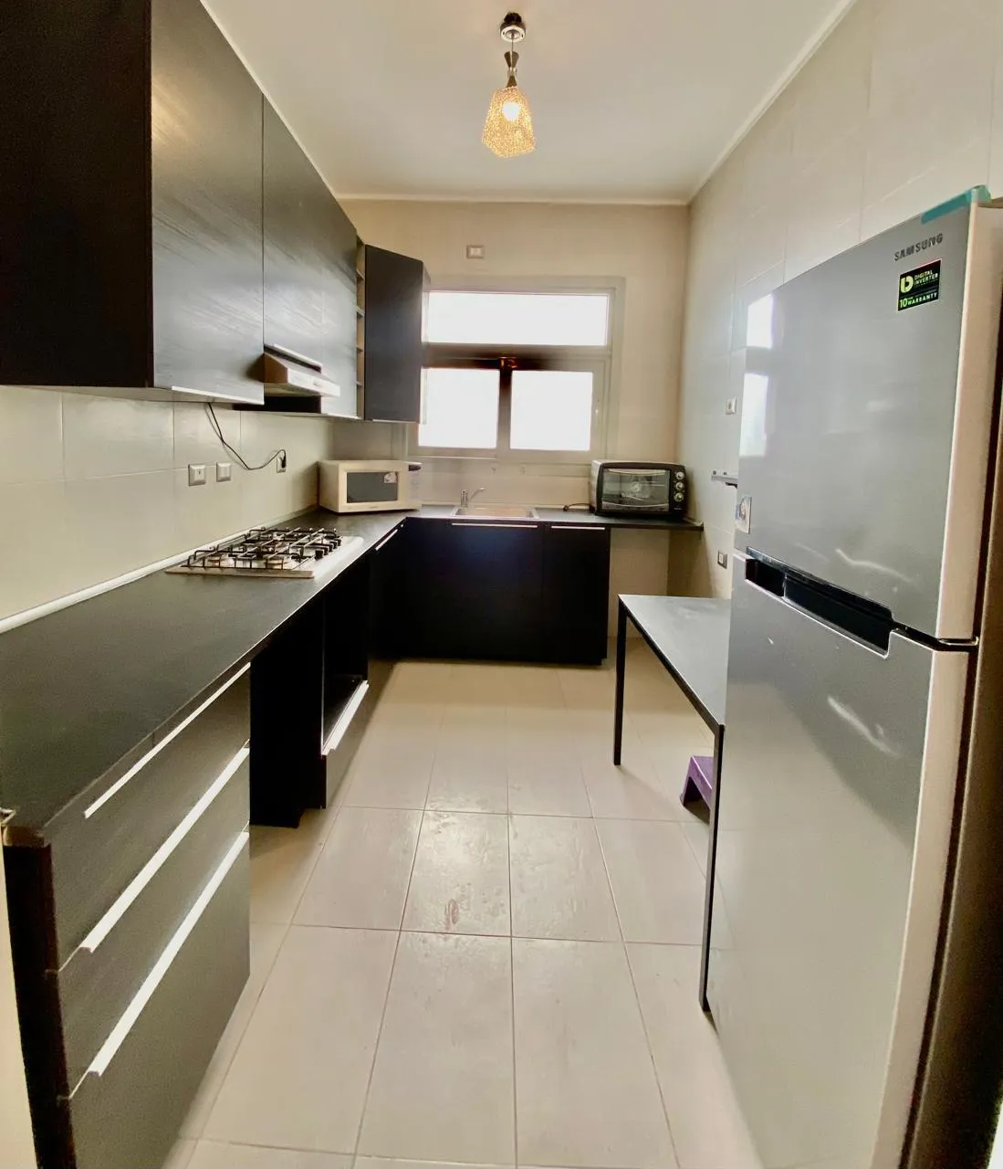Apartment for sale in The Village Gate in New Cairo of 88 m² with 1 bedrooms