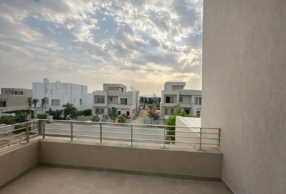 Townhouse for sale in Palm Hills Golf Views in 6th of October City of 252 m² with 4 bedrooms
