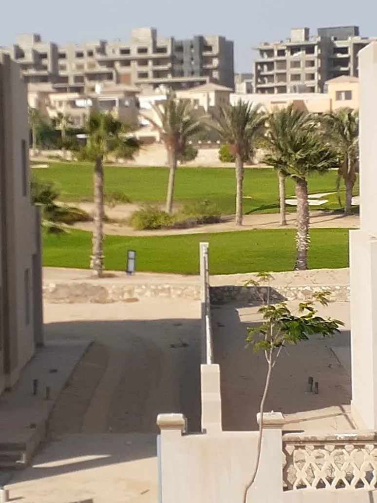 Townhouse for sale in Palm Hills Golf Views in 6th of October City of 252 m² with 4 bedrooms