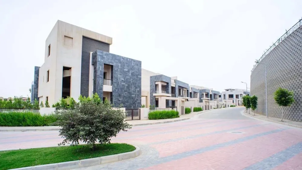 Twinhouse for sale in Al Karma 4 in Northern Expansion of 400 m² with 4 bedrooms