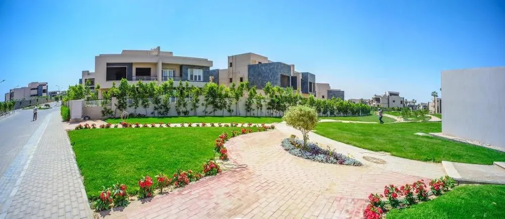 Twinhouse for sale in Al Karma 4 in Northern Expansion of 400 m² with 4 bedrooms