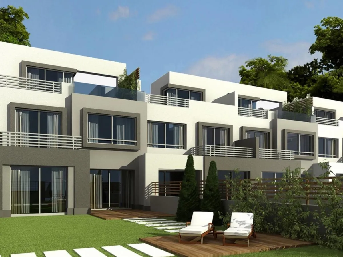 Townhouse for sale in Palm Hills Golf Extension in 6th of October City of 365 m² with 3 bedrooms