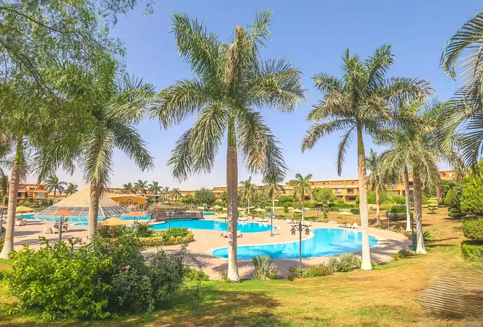 Townhouse for sale in Pyramids Walk in 6th of October City of 400 m² with 4 bedrooms